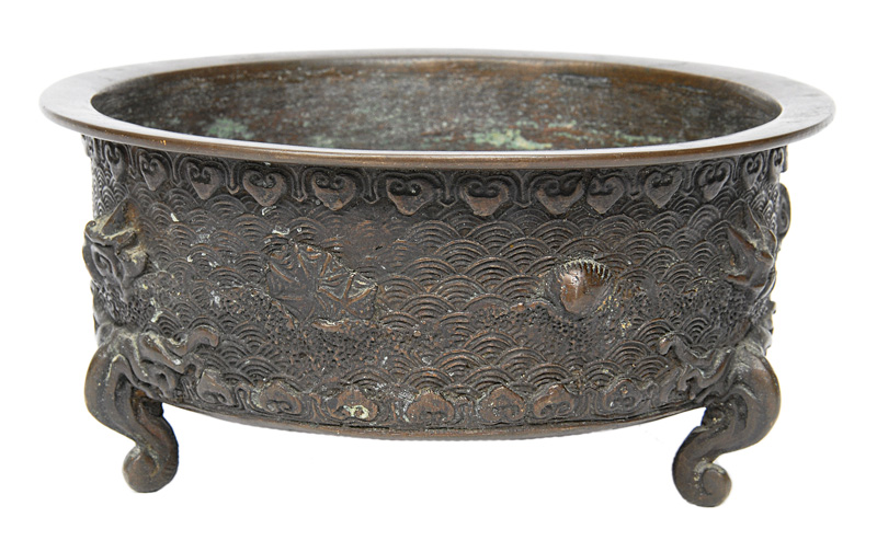A bronze bowl with marine decoration