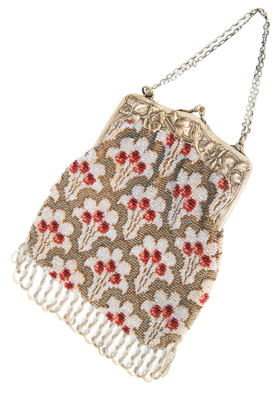 A silver Art Nouveau handbag with pearl embroidering