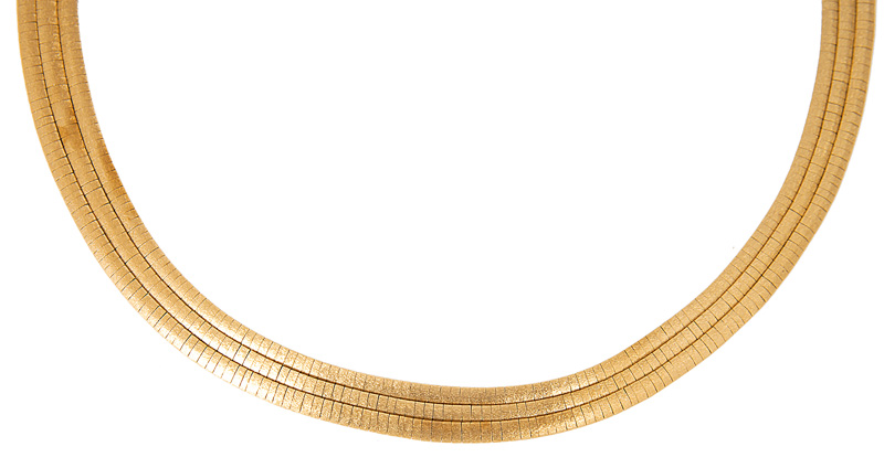 A gold necklace with matching bracelet