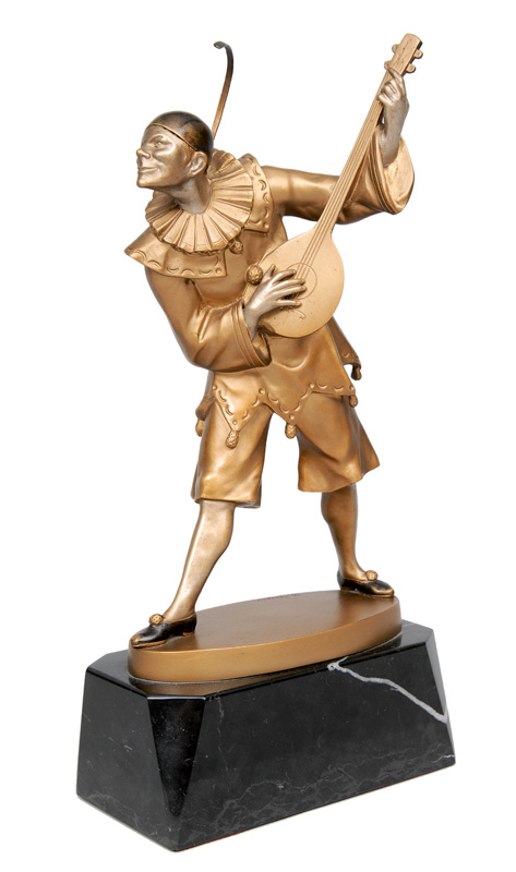 A bronze figure "Harlekin making music"