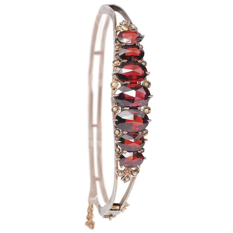 An antique garnet bangle bracelet