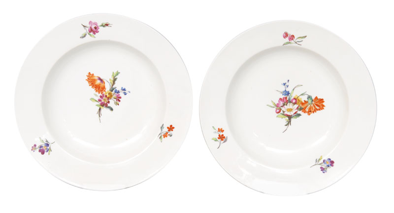 A pair of soup plates with flower painting
