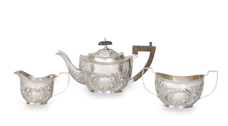 A tea service with textured Barouqe decor
