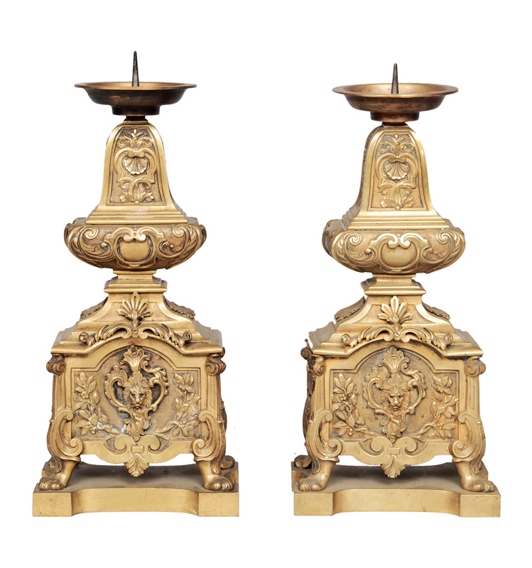 A pair of Louis-Quinze candle holders with masks of lions
