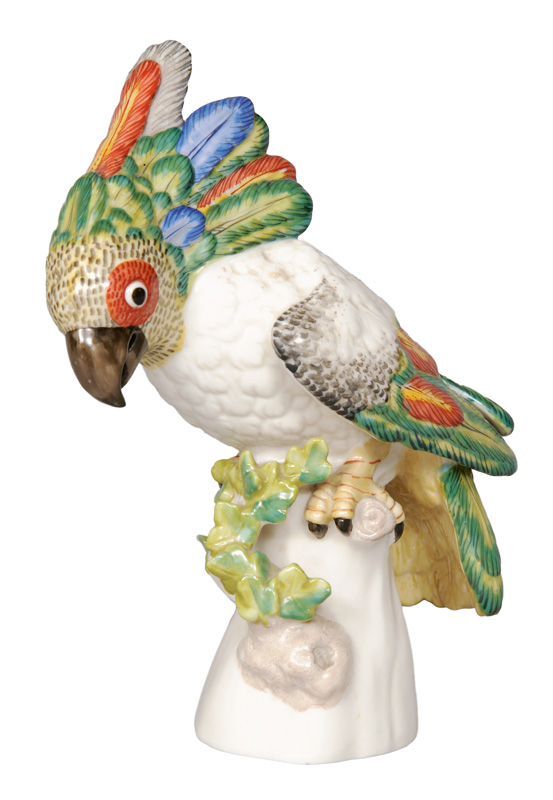 A small figurine "Cockatoo" on branch base