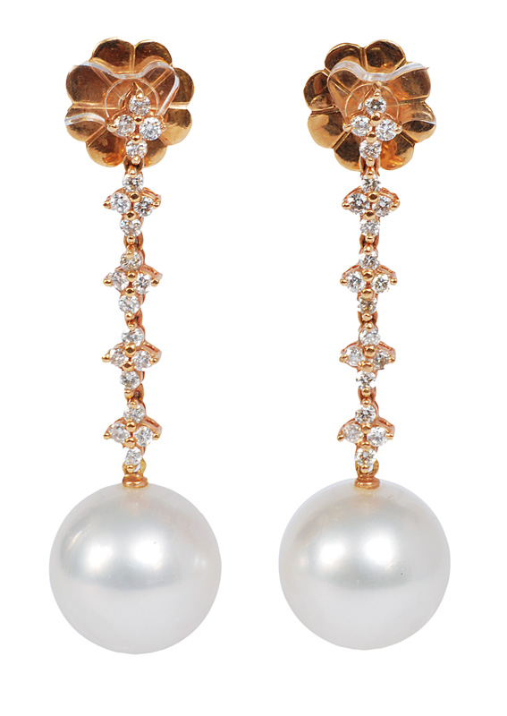 A pair of Southsea pearls earrings with diamonds