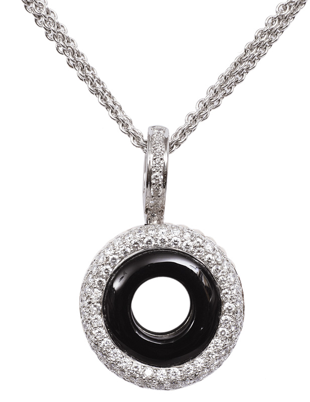 An onyx diamond pendant with necklace