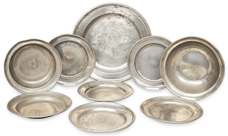 A set of 9 tin dishes