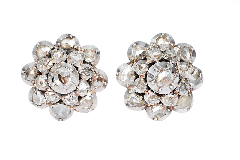 A pair of antique diamond earrings