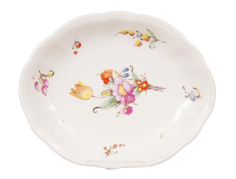 A curved bowl with flower painting