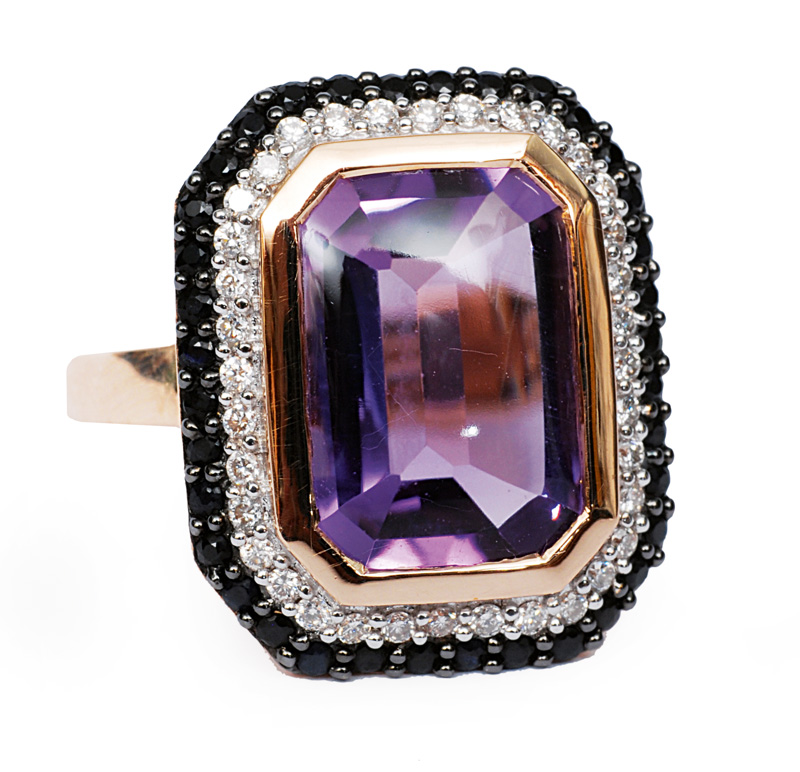 An amethyst ring with sapphires and diamonds