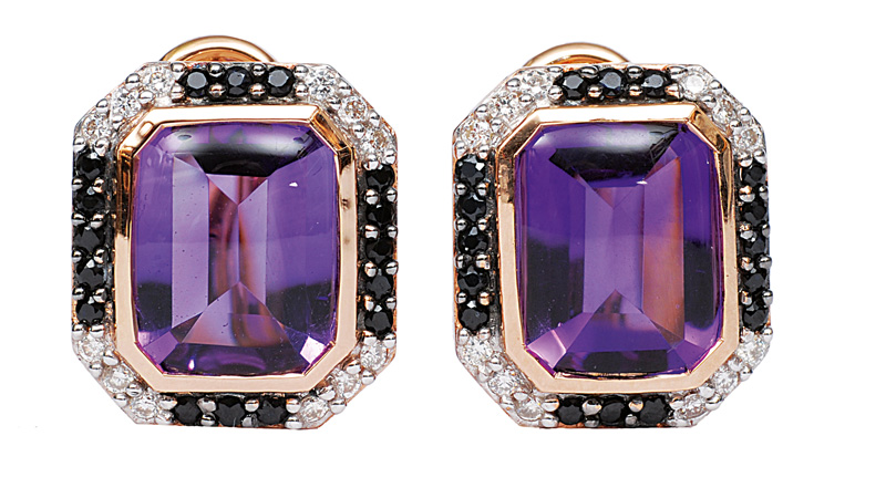 A pair of amethyst earstuds with sapphires and diamonds