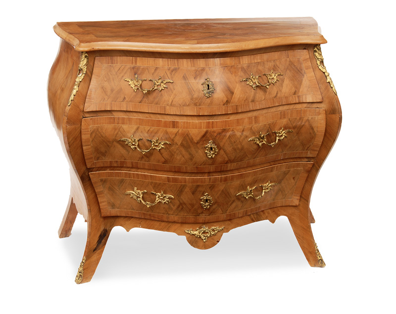 A chest of drawers in the style of Rococo