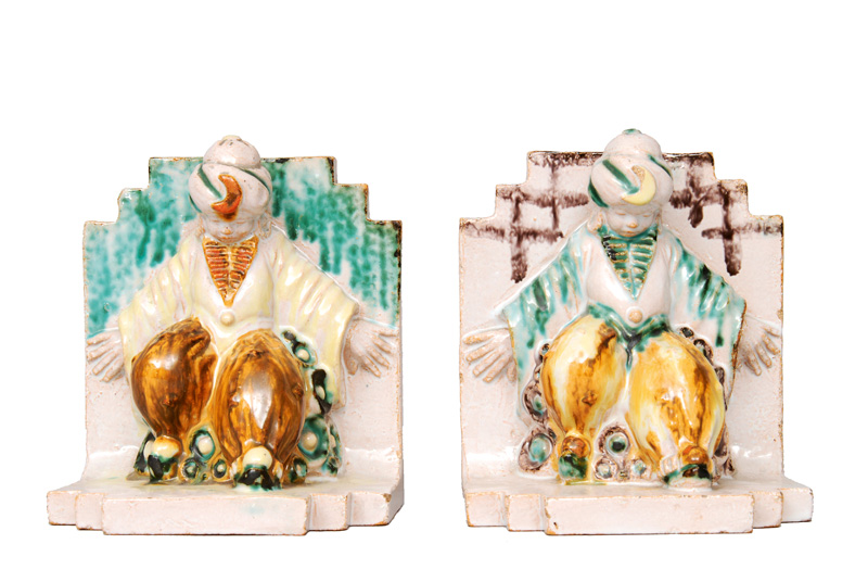 A pair of faience book end "Orientals"