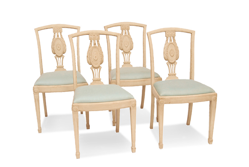 A set of 4 coloured chairs in the Gustav style