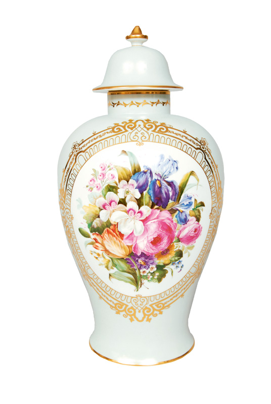 A lidded vase with flower painting on seladon ground
