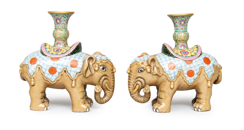 A pair of vases in the shape of elephants