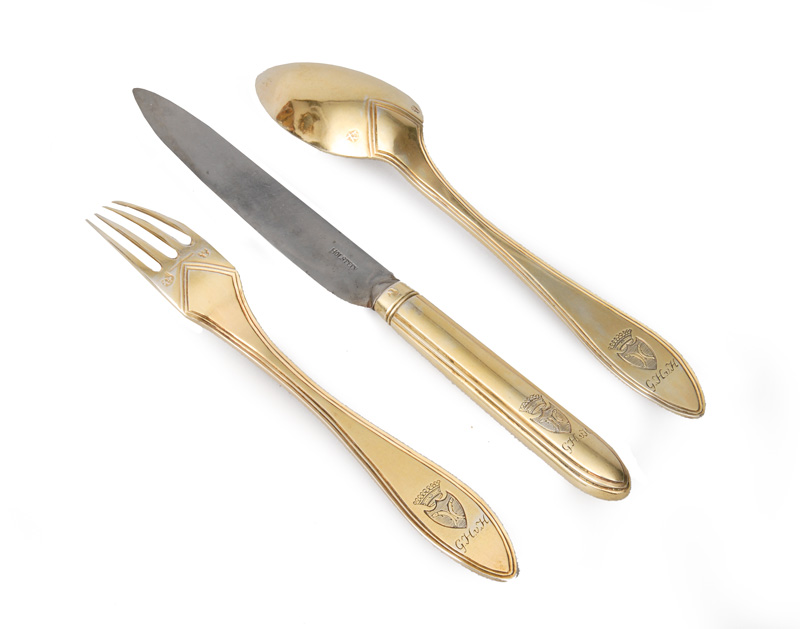A gilded travel cutlery