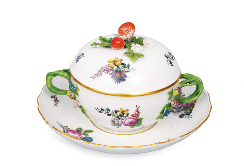 A small tureen on saucer with fine flower painting