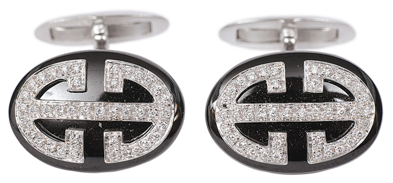 A pair of onyx diamond cuff links