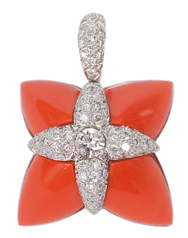 A coral diamond pendant with necklace