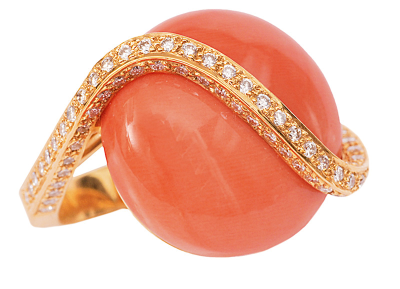 A coral diamond ring