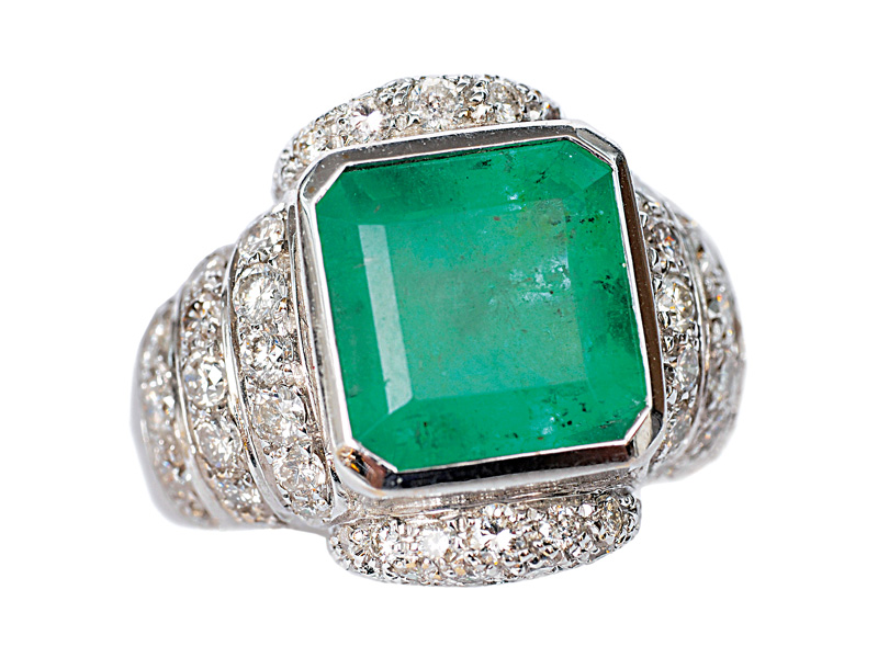 A large emerald diamond ring