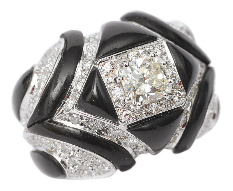 A diamond onyx ring with a solitaire daimond