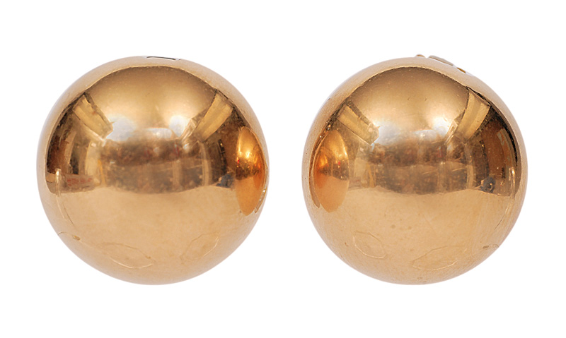 A pair of golden earclips