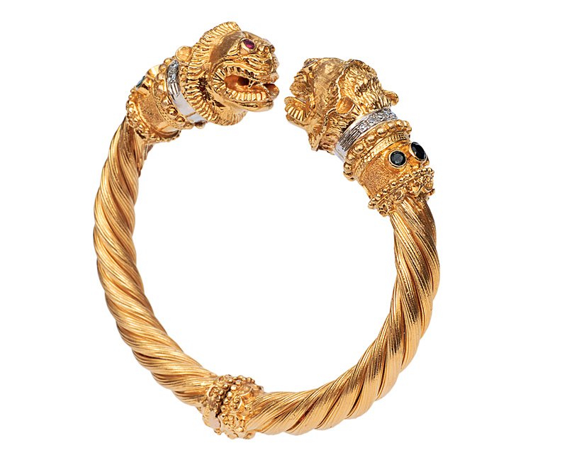 A bangle bracelet with lions heads by Ilias Lalaounis