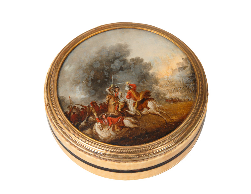 An ivory box with battle scene