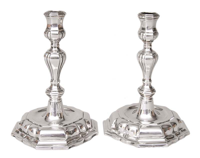 A pair of Baroque candlesticks