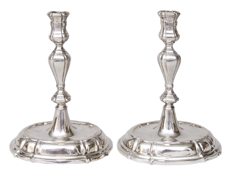 A pair of Baroque candlesticks