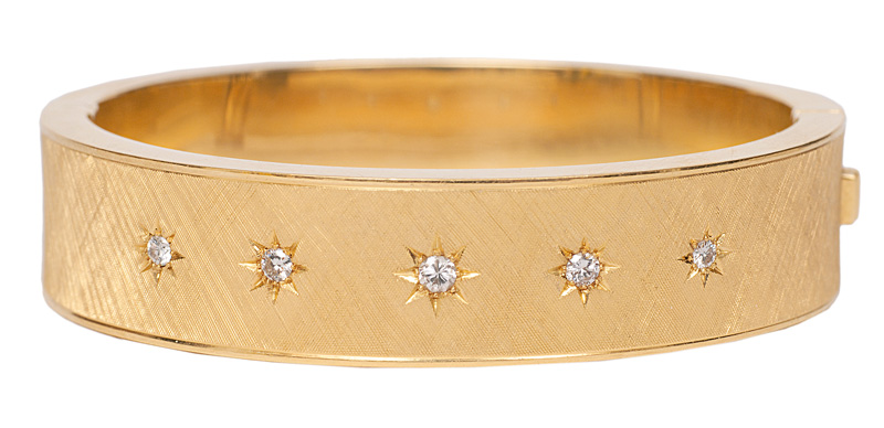 A golden bracelet with diamonds