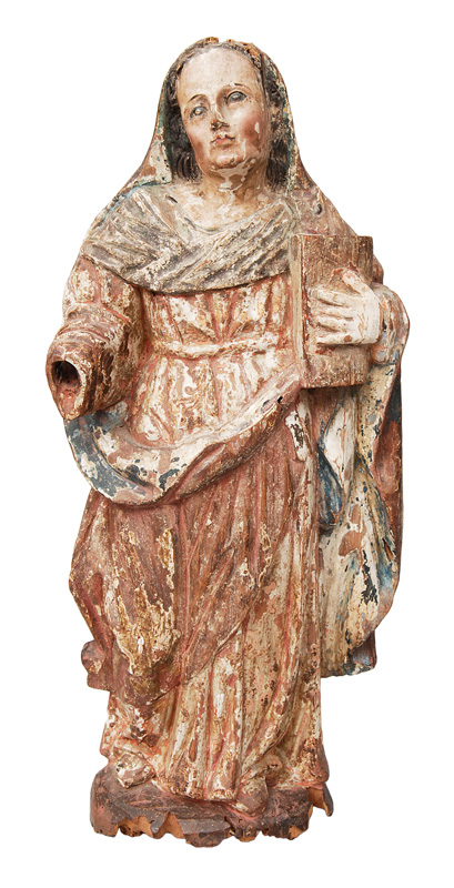 A wood sculpture "Saint with book"
