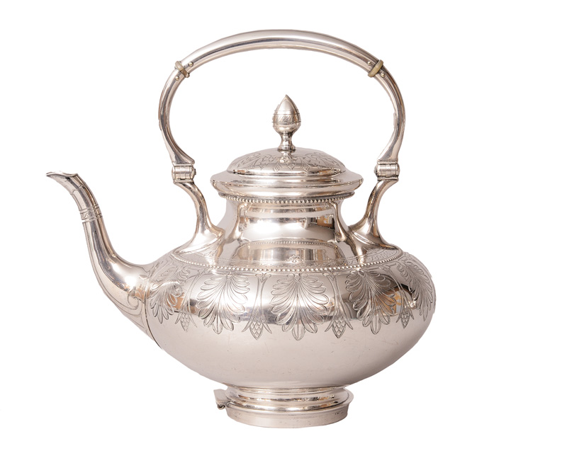 A large tea vessel with engraved ornaments