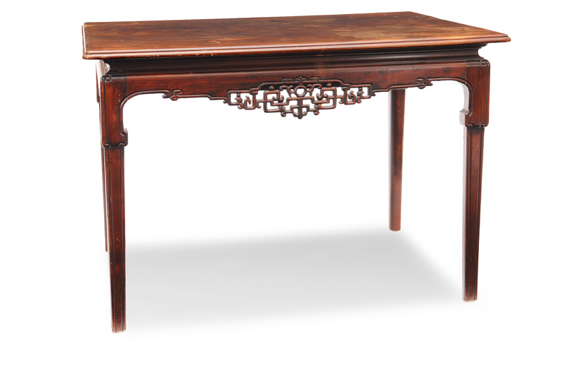 A table with fretwork frame