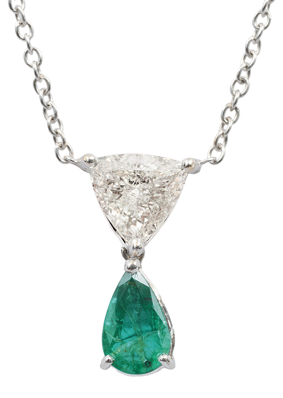 An emerald diamond pendant with necklace