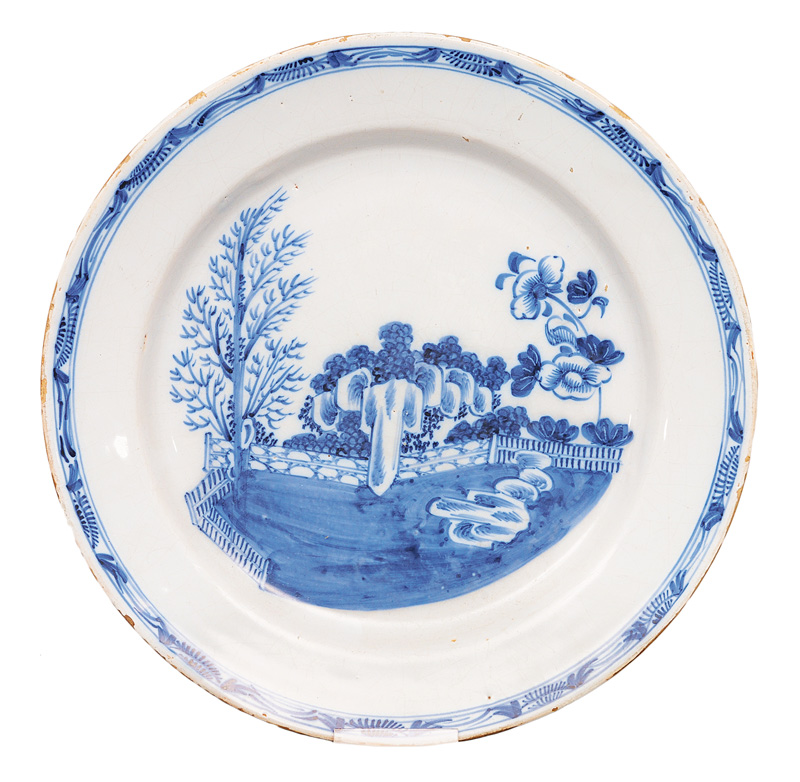 A faience plate with Chinese garden
