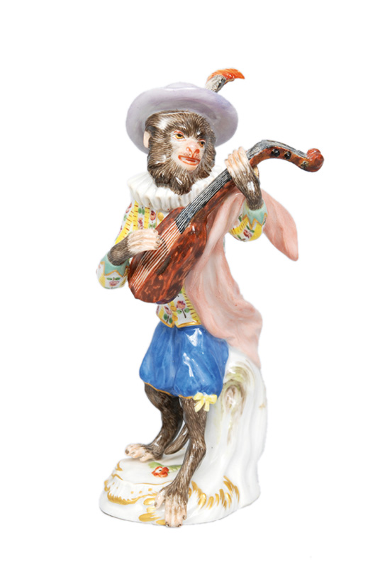 A figurine "Guitar player" of serial "Music playing monkeys"