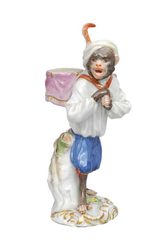 A figurine "Kettle drum carrier" of serial "Music playing monkeys"