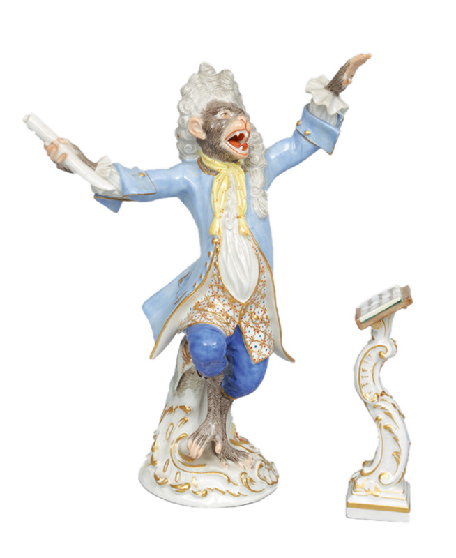 A figurine "Chief conductor with music desk" of "Music playing monkeys"