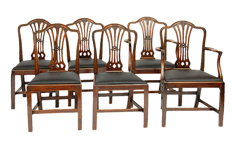 A set of 6 chairs and 2 armchairs in Hepplewhite style
