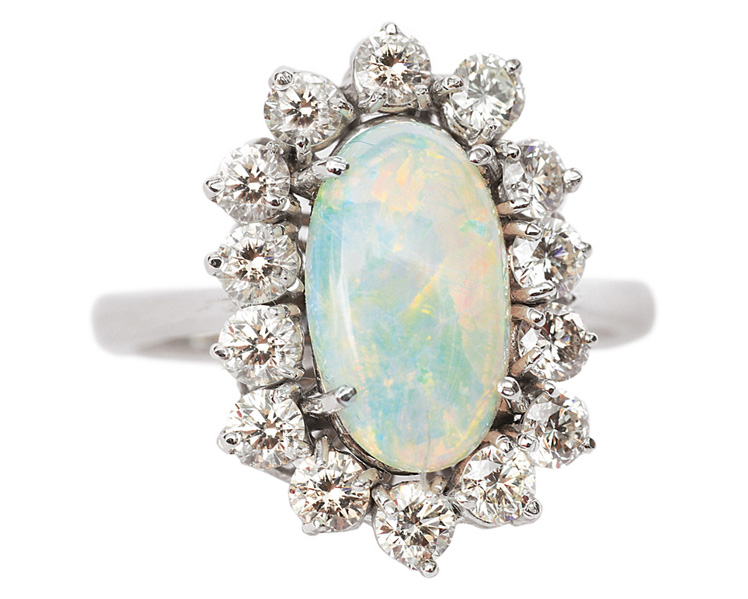 An opal diamond ring