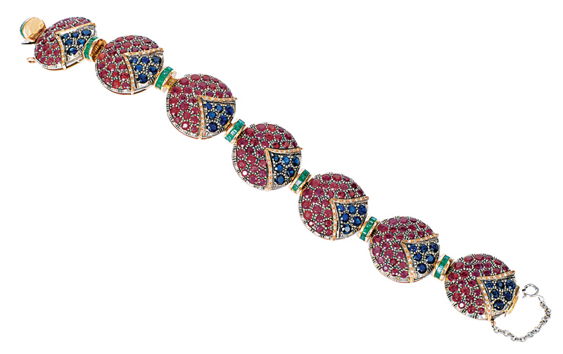 A modern ruby sapphire emerald bracelet
