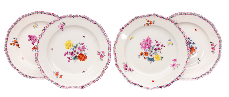 A set of 4 plates with garland-fretwork