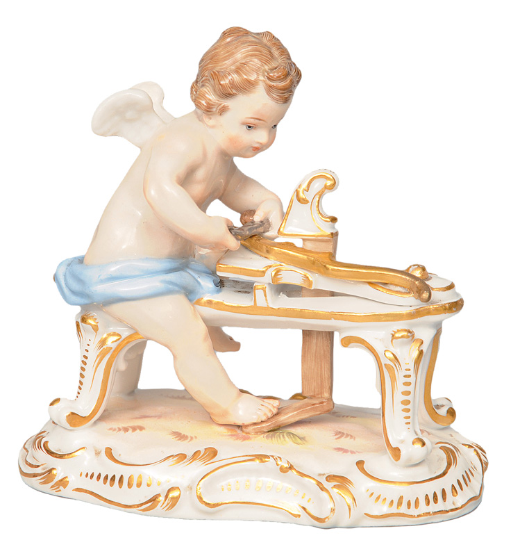 Figurine "Cupid filing his bow"