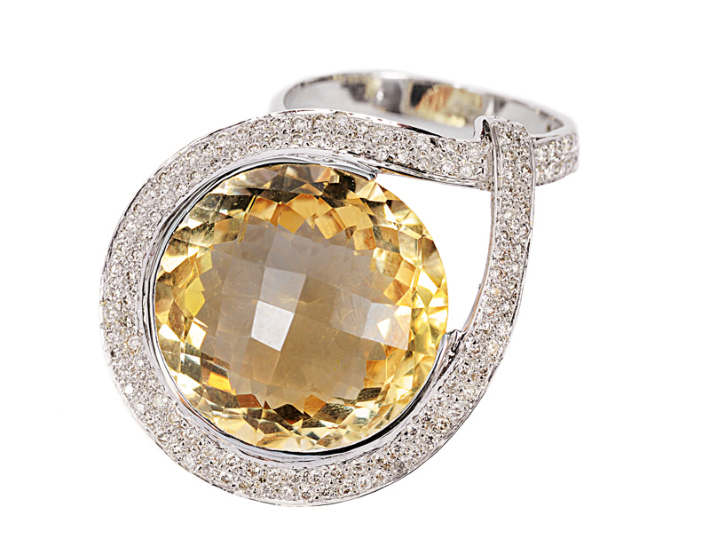 A large, modern citrine diamond ring
