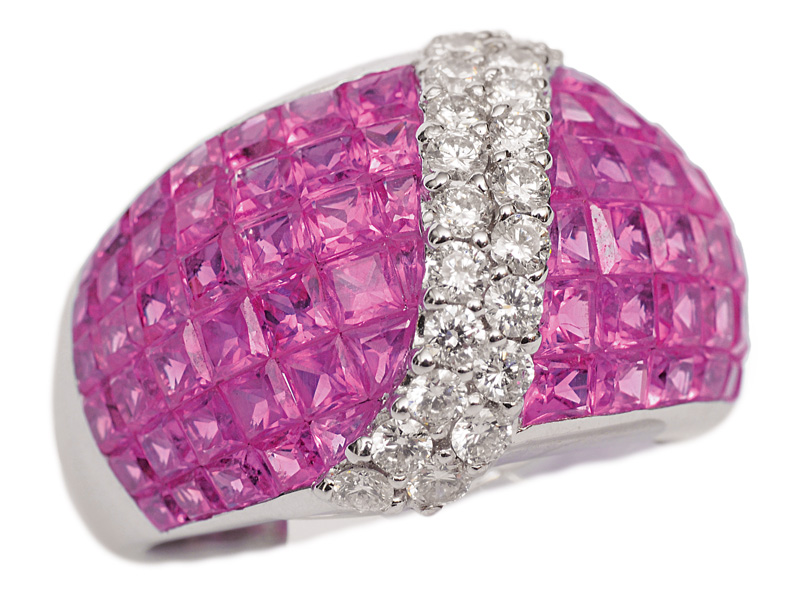 A pink sapphire diamond ring