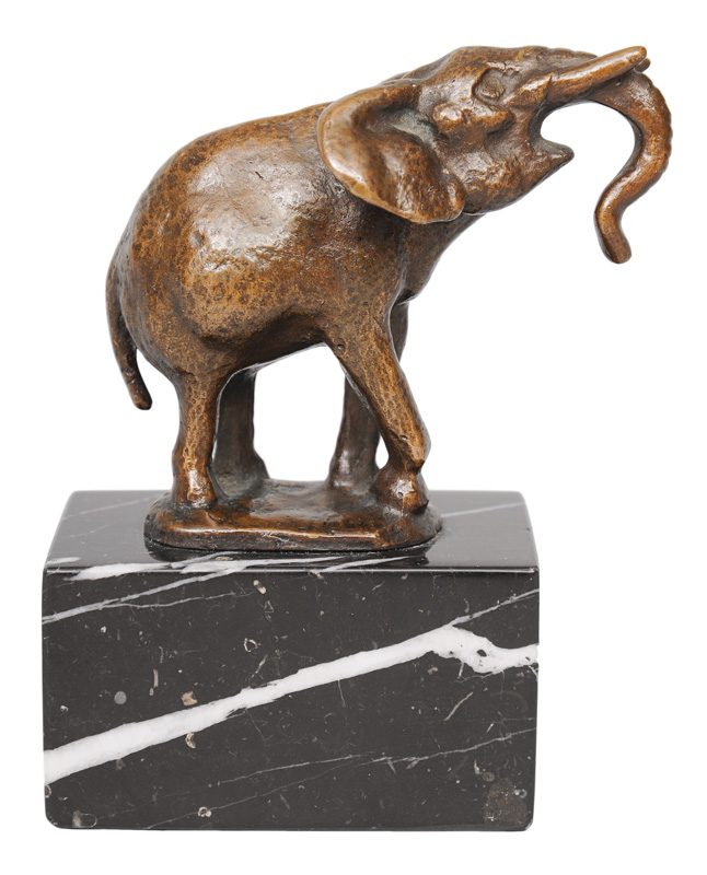 A small bronze figure "A trumpeting elephant"
